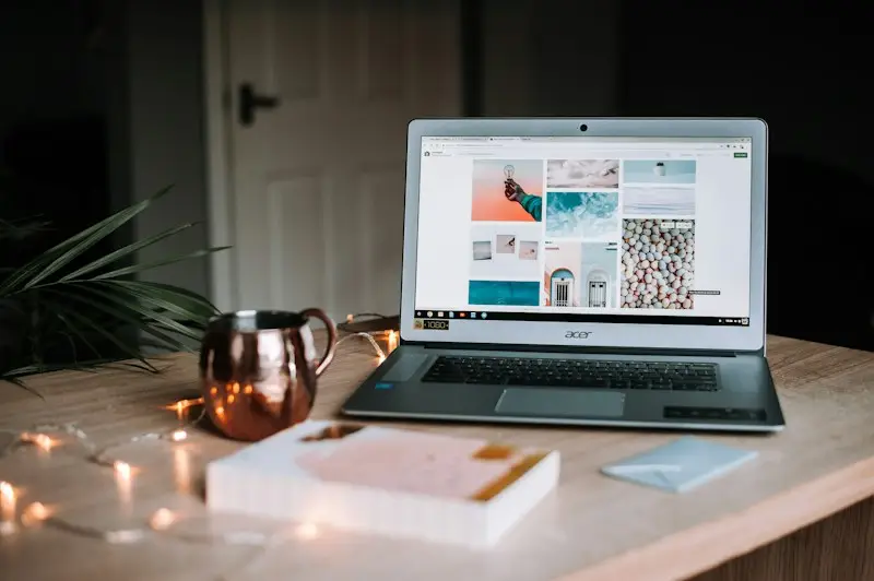 Travel planner working on a laptop with maps and destinations